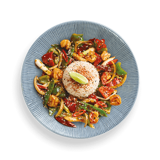 bold + fiery. mangetout. peppers. onion. hot red chillies. a dome of white rice. sesame seeds. shichimi. lime