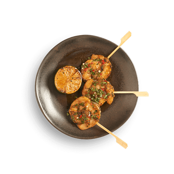 three grilled prawn skewers marinated in lemongrass + chilli.
served with a caramelised lime